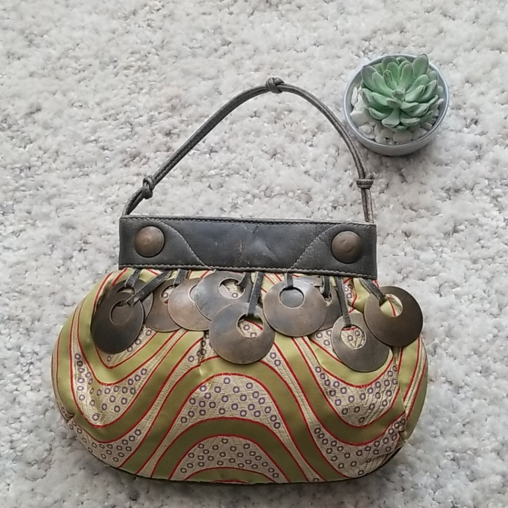 🛍  "Bold & Beautiful: Multicolor Foundry Purse with Brass Accents"